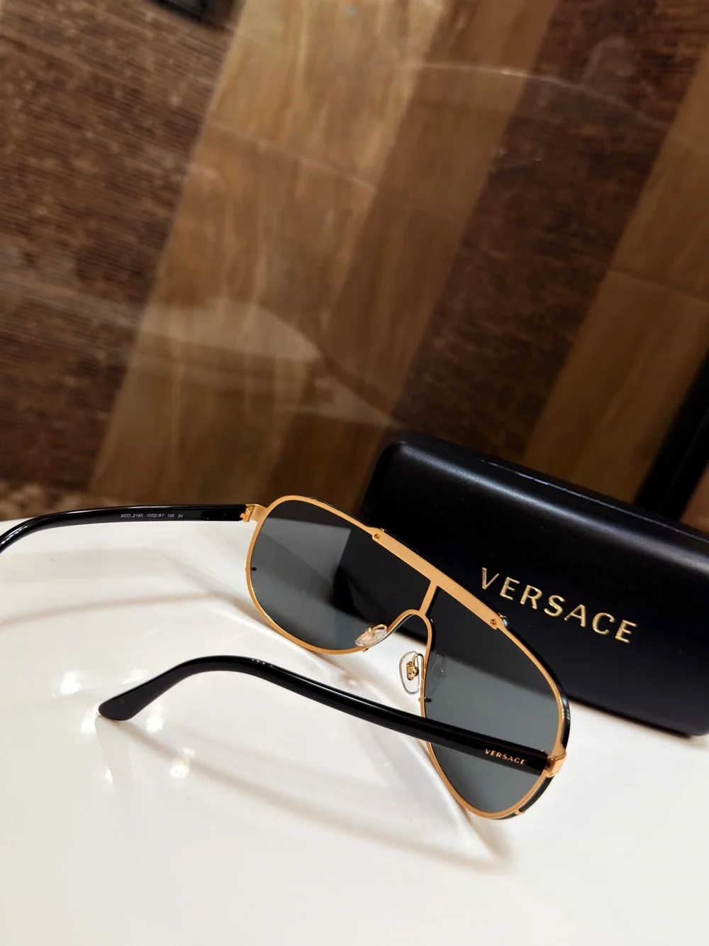 Versace MENS WOMENS Unisex Gold and Black Shield Sunglasses VE2140